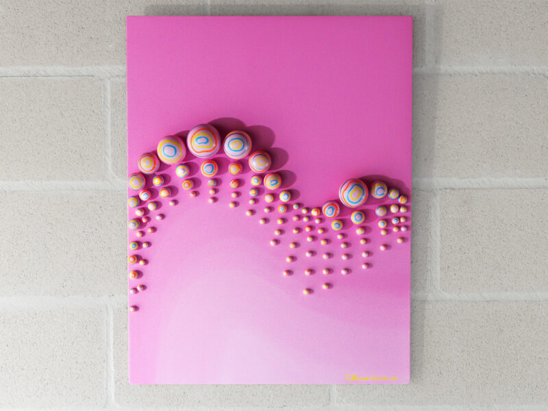 Pink Valley contemporary wall sculpture: arranged spheres creating illusion of fluid motion in monochromatic palette with subtle multicolored lines and intricate patterns